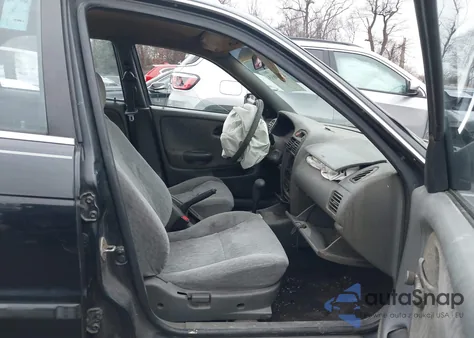 2002 Suzuki Esteem Gl/Glx z USA, uszkodzony, nr VIN JS2GB41S525403158